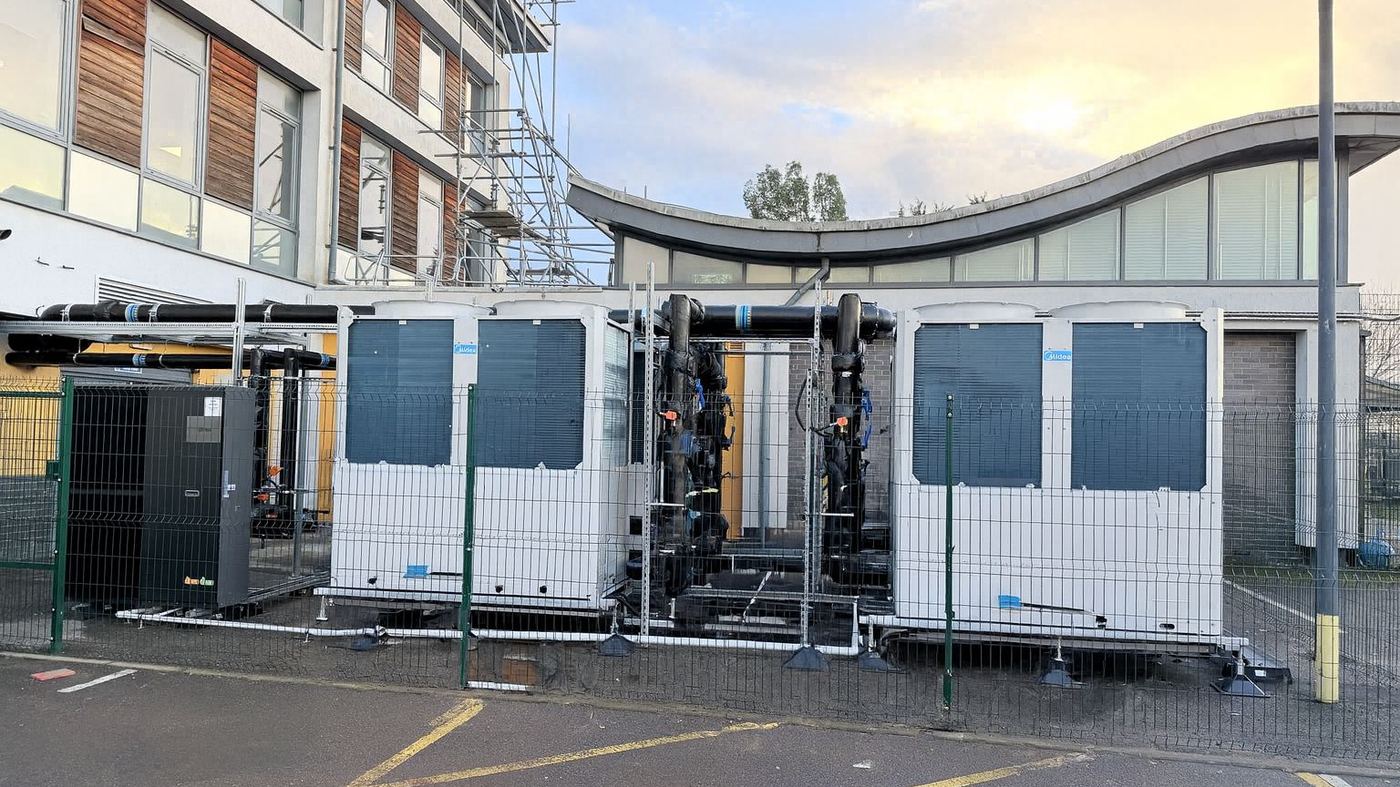 Air source heat pumps installed outside a school building